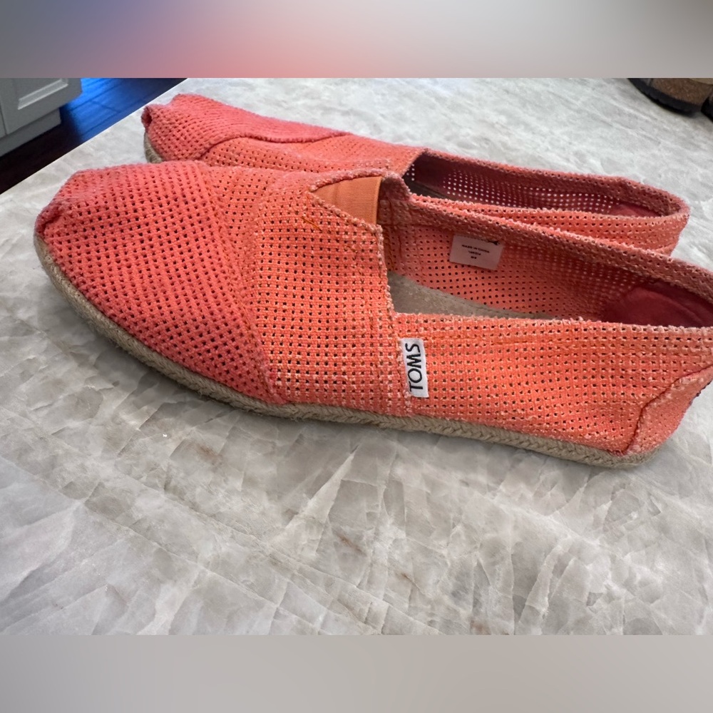 TOMS - Orange “square-pattern” slip-on Alpargata shoes.  Size 9 women